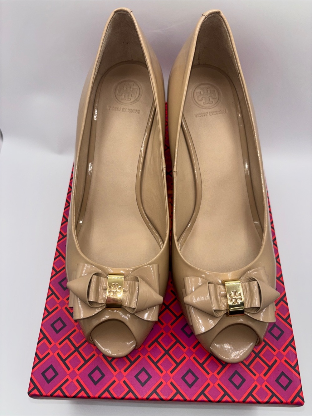 Tory Burch Beige Patent Leather Peep-Toe Bow Wedges with Gold Logo
